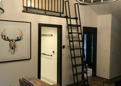 Tiny Home With Loft Ladder Ascending To Bedroom