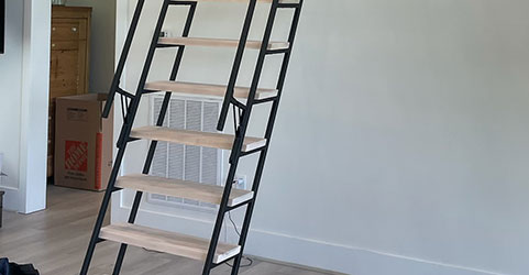 close up of loft ladder by wall