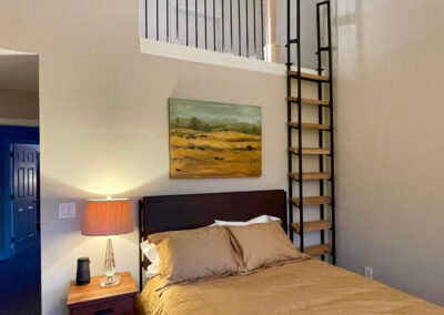 Loft Living Space & Loft Ladder In Bedroom Corner (angle view)