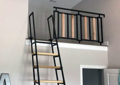 Close-Up of Steel and Wood Loft Ladder and Partition Wall
