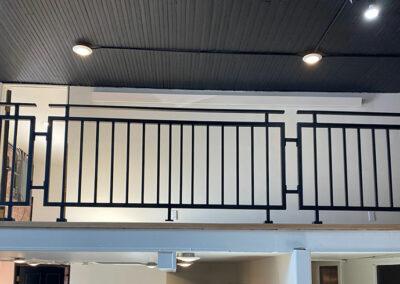 Loft Living Space With Black Steel Partition Railing